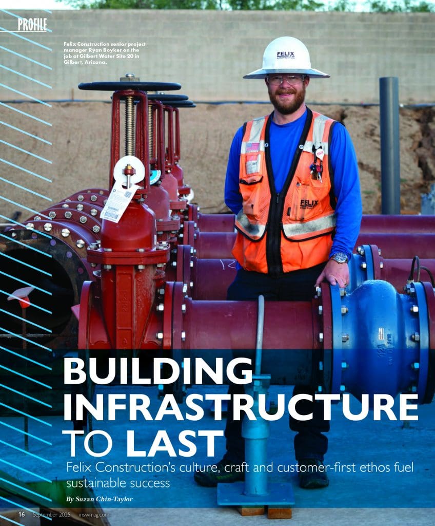 A construction worker in safety gear stands beside large red and blue water pipes at a worksite, with text about building lasting infrastructure overlaid.